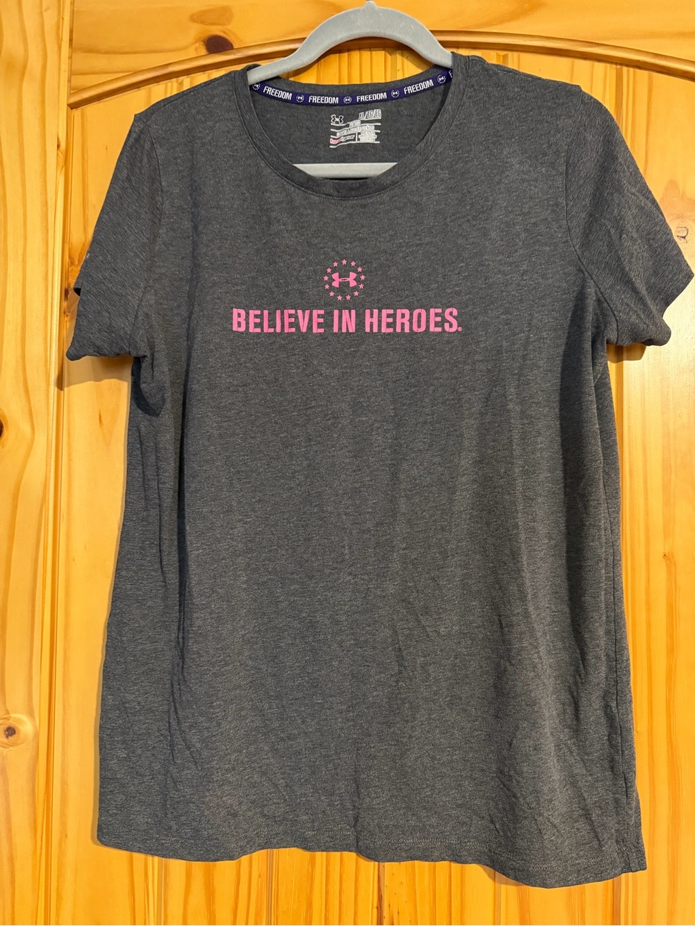 Under Armour Charcoal Short Sleeve Crew Tee with Pink 'Believe in Heroes' Logo